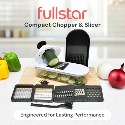 White and black fullstar Pro Core 6-in-1 Vegetable Chopper and Mandoline Slicer with various blades and container.