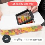 White and black fullstar Pro Core 6-in-1 Vegetable Chopper and Mandoline Slicer with various blades and container.
