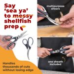 Two pairs of Gidli kitchen scissors, one all-purpose and one for seafood, with black and white handles.
