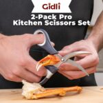 Two pairs of Gidli kitchen scissors, one all-purpose and one for seafood, with black and white handles.