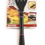 Black 11-inch Grip-EZ Fiskie, a combination fork and whisk utensil, shown in a kitchen setting.