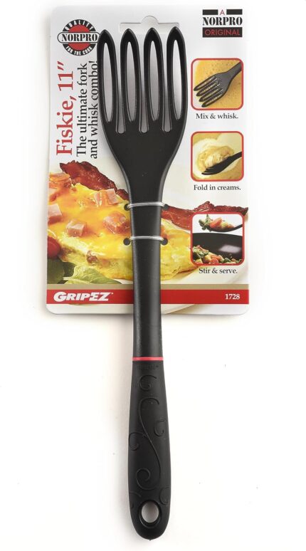 Black 11-inch Grip-EZ Fiskie, a combination fork and whisk utensil, shown in a kitchen setting.