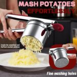 A red Minteem 15oz potato ricer made of stainless steel, shown with its silicone handle, ready for mashing.