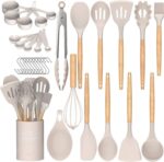 A complete 33-piece Umite Chef kitchen utensil set with khaki silicone heads and wooden handles, displayed with a holder and