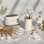 A complete 33-piece Umite Chef kitchen utensil set with khaki silicone heads and wooden handles, displayed with a holder and