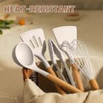 A complete 33-piece Umite Chef kitchen utensil set with khaki silicone heads and wooden handles, displayed with a holder and