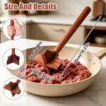 Wooden ground beef masher with a cross-shaped head, ideal for breaking up meat in non-stick pans.